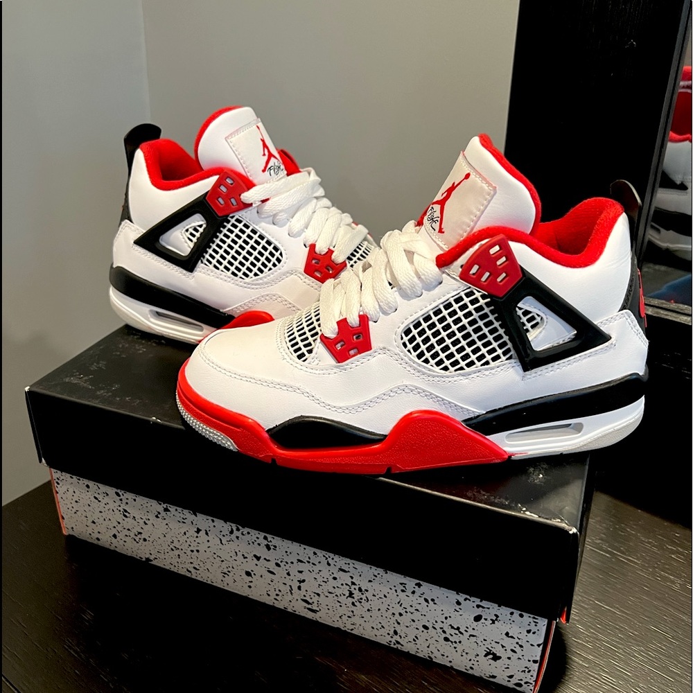 Air Jordan 4 Retro GS fire red. Size 3.5 gs. Brand new never worn.